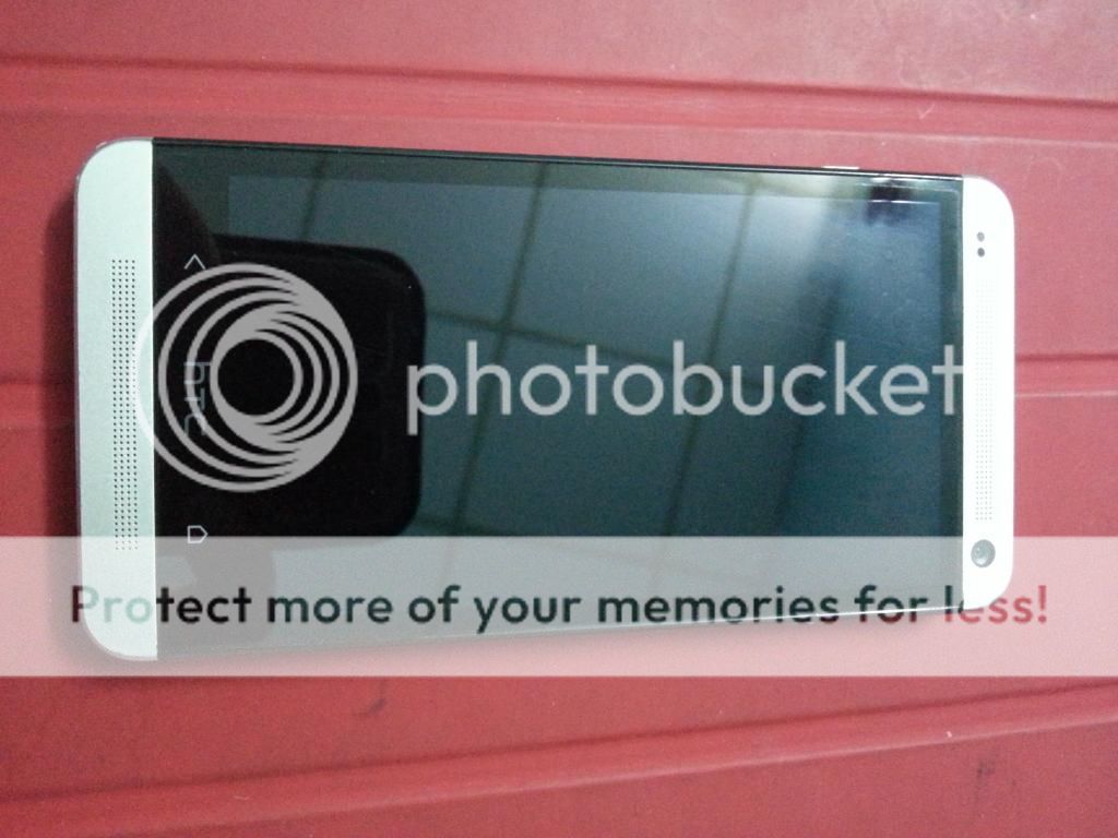 HTC one M7, phiên bản 2sim,camera ám tím. zin ốc. ngoại hình 95%